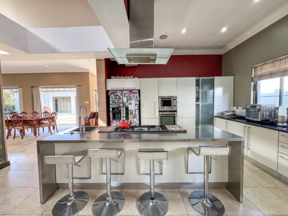 Large family home with exceptional design in the heart of Old Midstream.  Walking distance to school.
