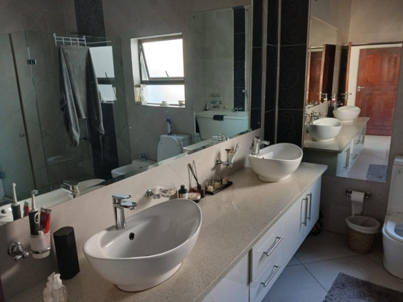 Elegant Full-Title Home for Sale in Midstream Retirement Estate