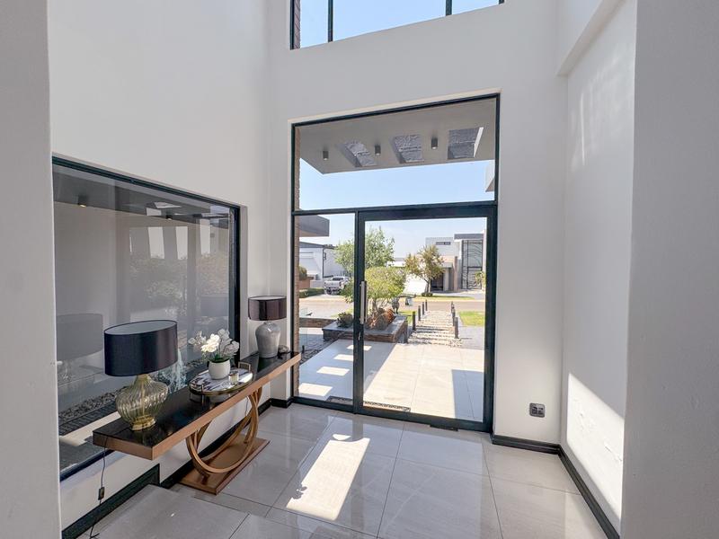 Impressive 5-Bedroom Luxury Home in Midstream Ridge Estate