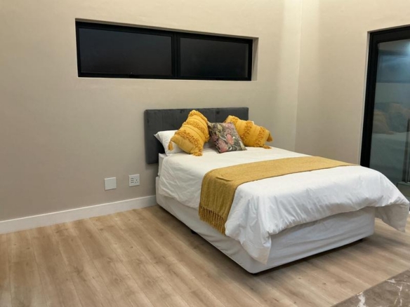 Modern 6 Bedroom Home for sale in Midstream Ridge Estate.