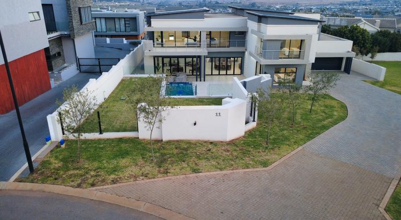 Modern 6 Bedroom Home for sale in Midstream Ridge Estate.