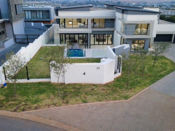 Modern 6 Bedroom Home for sale in Midstream Ridge Estate.