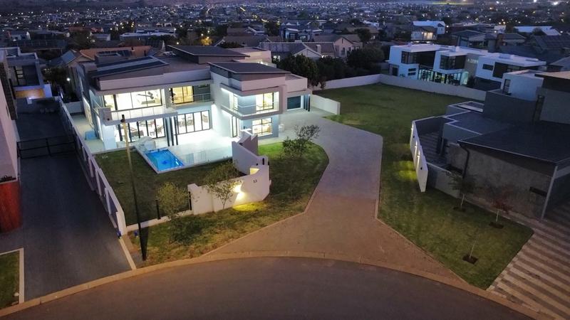 Modern 6 Bedroom Home for sale in Midstream Ridge Estate.