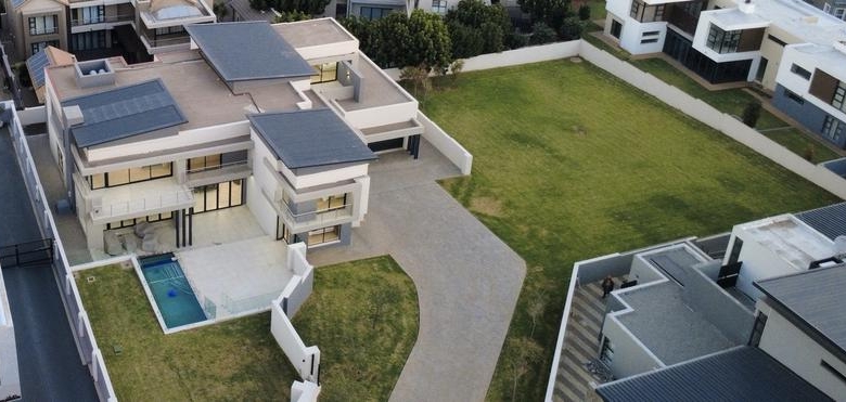 Modern 6 Bedroom Home for sale in Midstream Ridge Estate.