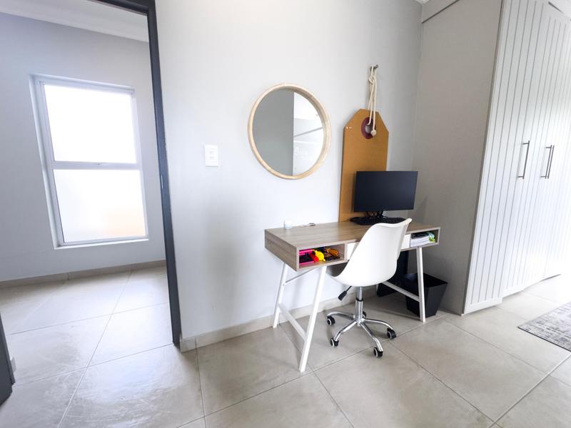 Spacious 4-Bedroom Family Home in Midstream Ridge Estate