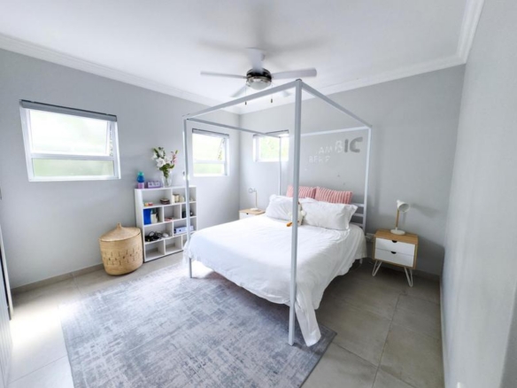 Spacious 4-Bedroom Family Home in Midstream Ridge Estate
