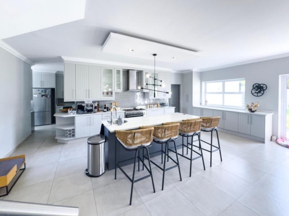 Spacious 4-Bedroom Family Home in Midstream Ridge Estate