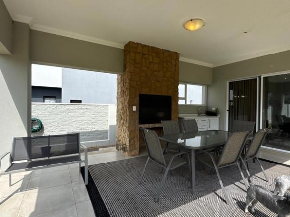Spacious 4-Bedroom Family Home in Midstream Ridge Estate