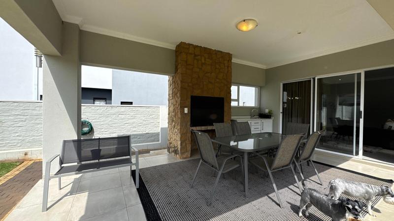 Spacious 4-Bedroom Family Home in Midstream Ridge Estate