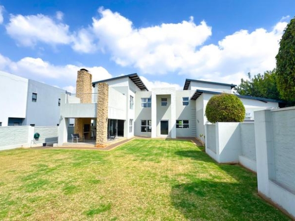 Spacious 4-Bedroom Family Home in Midstream Ridge Estate