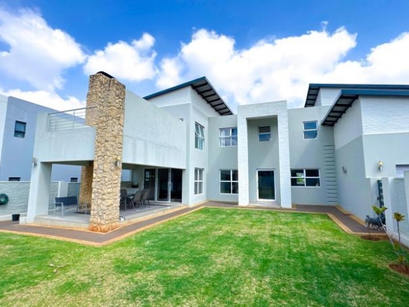 Spacious 4-Bedroom Family Home in Midstream Ridge Estate