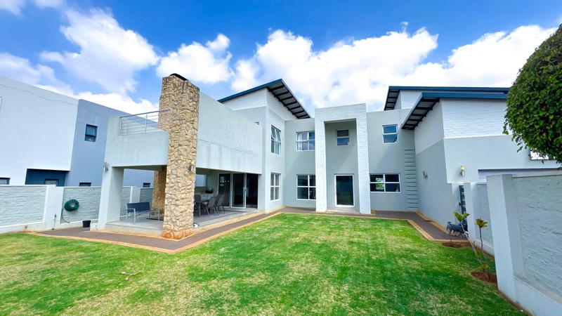 Spacious 4-Bedroom Family Home in Midstream Ridge Estate