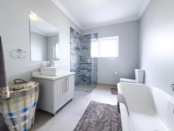 Spacious 4-Bedroom Family Home in Midstream Ridge Estate