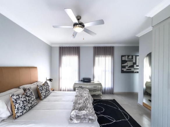 Spacious 4-Bedroom Family Home in Midstream Ridge Estate