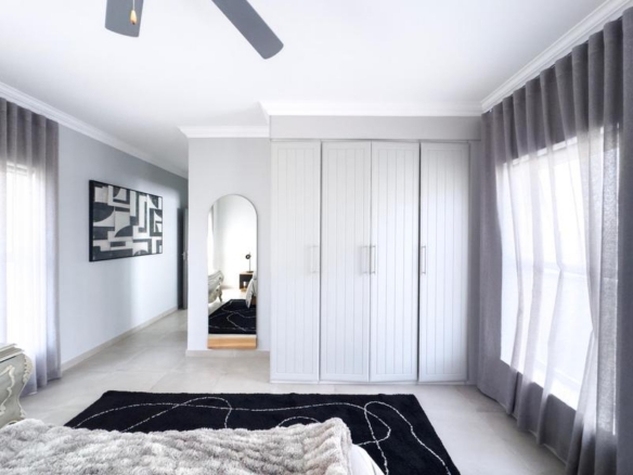 Spacious 4-Bedroom Family Home in Midstream Ridge Estate