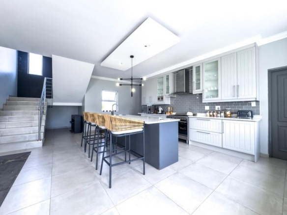 Spacious 4-Bedroom Family Home in Midstream Ridge Estate