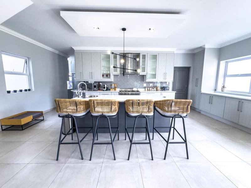 Spacious 4-Bedroom Family Home in Midstream Ridge Estate