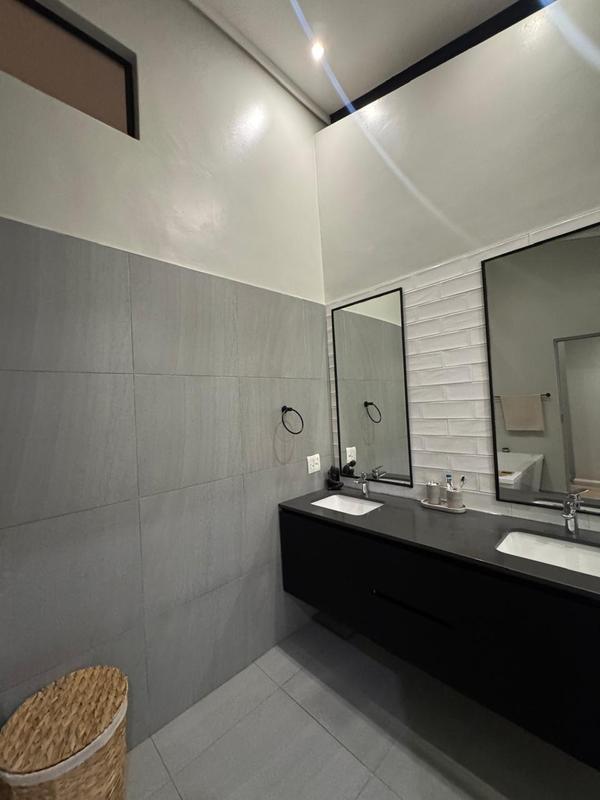 WHEN LUXARY MEETS EXPECTATIONS IN MIDSTREAM ESTATE. STEP INTO LUXURY WITH A VIEW OF THE GOLF COURSE, DAMS AND WILDLIFE!
