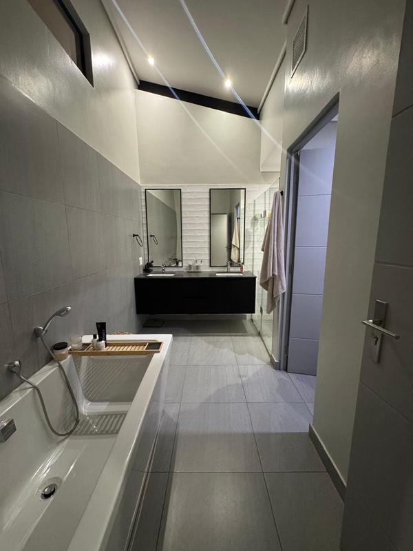 WHEN LUXARY MEETS EXPECTATIONS IN MIDSTREAM ESTATE. STEP INTO LUXURY WITH A VIEW OF THE GOLF COURSE, DAMS AND WILDLIFE!