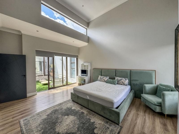 Spacious Modern Home on the Greenbelt in Midstream Ridge