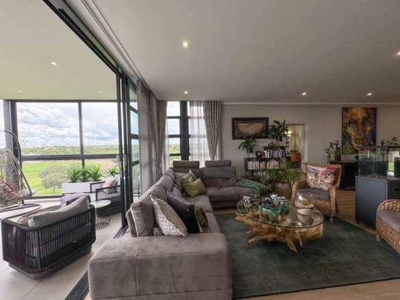 Exclusive Luxury corner apartment for sale at Ascend to Midstream with spectacular golf course and pond views.