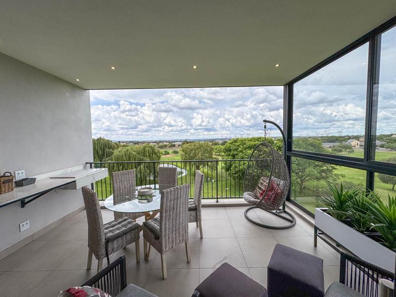 Exclusive Luxury corner apartment for sale at Ascend to Midstream with spectacular golf course and pond views.