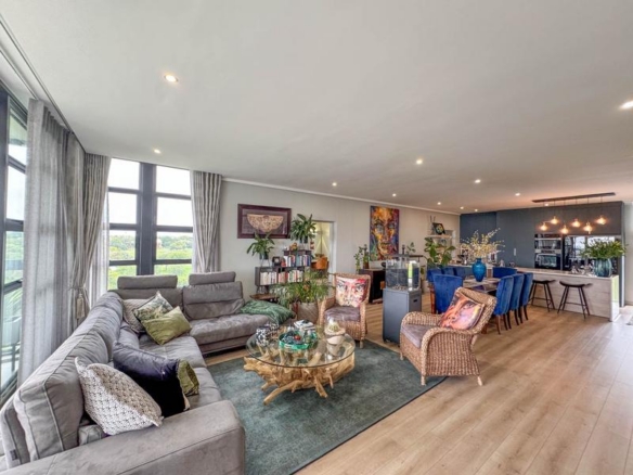 Exclusive Luxury corner apartment for sale at Ascend to Midstream with spectacular golf course and pond views.