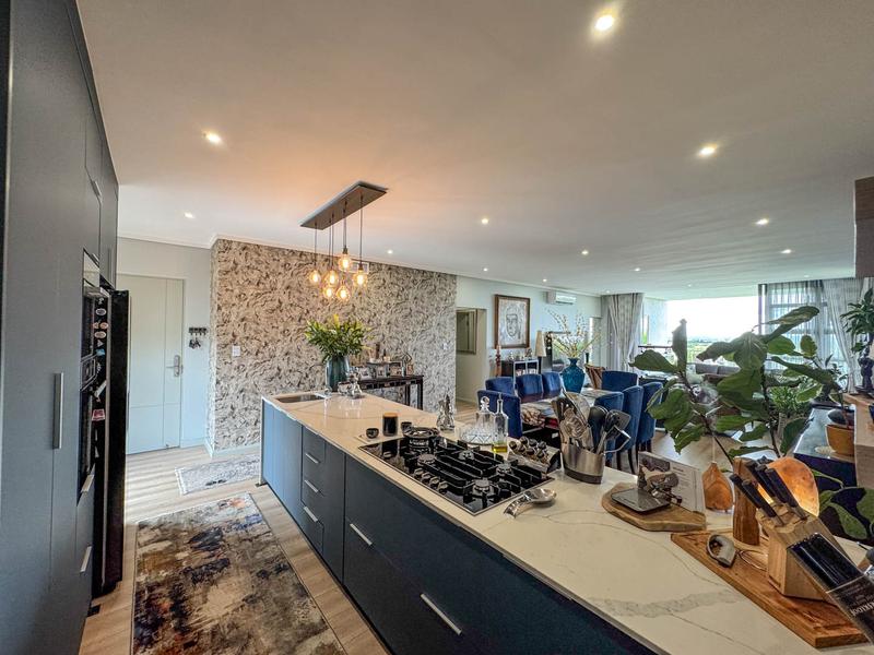 Exclusive Luxury corner apartment for sale at Ascend to Midstream with spectacular golf course and pond views.
