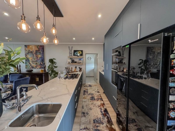 Exclusive Luxury corner apartment for sale at Ascend to Midstream with spectacular golf course and pond views.