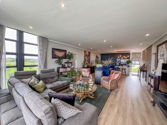 Exclusive Luxury corner apartment for sale at Ascend to Midstream with spectacular golf course and pond views.
