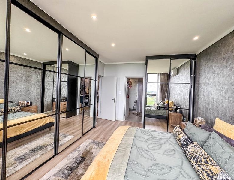 Exclusive Luxury corner apartment for sale at Ascend to Midstream with spectacular golf course and pond views.
