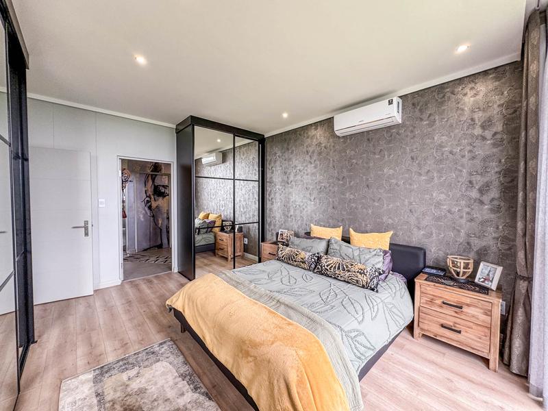 Exclusive Luxury corner apartment for sale at Ascend to Midstream with spectacular golf course and pond views.
