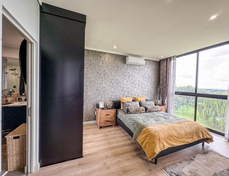 Exclusive Luxury corner apartment for sale at Ascend to Midstream with spectacular golf course and pond views.