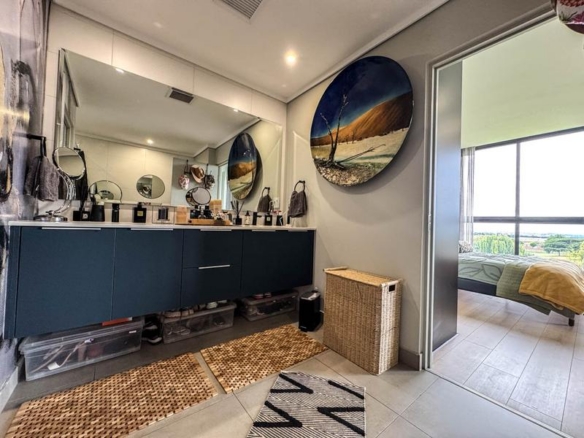 Exclusive Luxury corner apartment for sale at Ascend to Midstream with spectacular golf course and pond views.