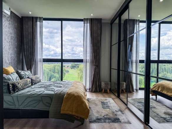 Exclusive Luxury corner apartment for sale at Ascend to Midstream with spectacular golf course and pond views.