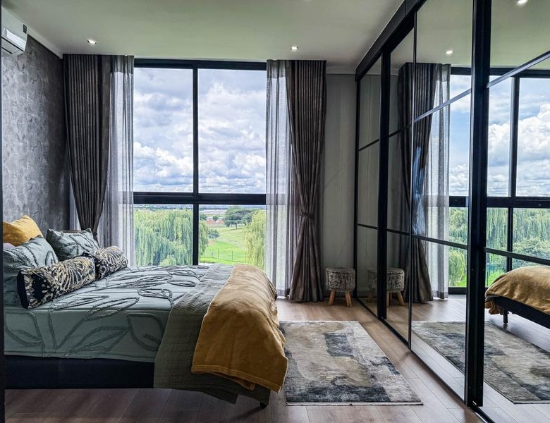 Exclusive Luxury corner apartment for sale at Ascend to Midstream with spectacular golf course and pond views.