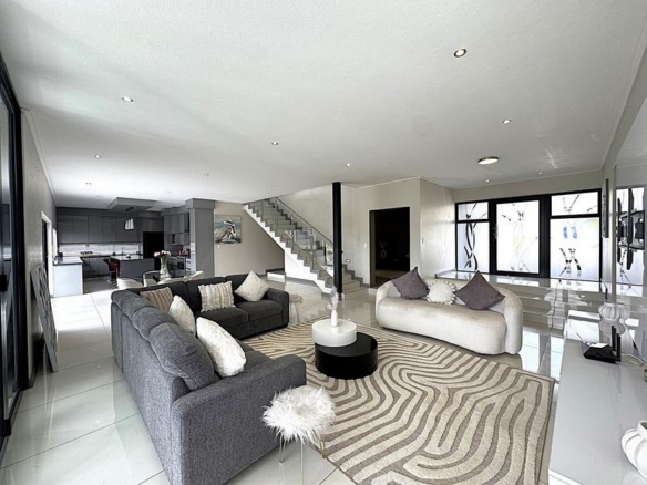 RENT A LUXURIOUS FAMILY LIVING AT ITS FINEST IN MIDSTREAM RIDGE