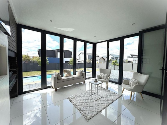 RENT A LUXURIOUS FAMILY LIVING AT ITS FINEST IN MIDSTREAM RIDGE